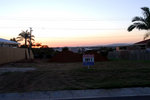 20090917001W (Sunset view from my land. Some more dirt dropped off by the builder)