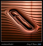 Paper clip on water